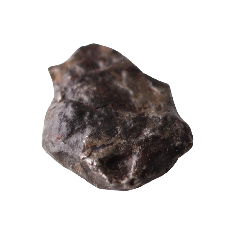 Rare ungrouped iron meteorite Mdeïné 003 from MBS Meteorite showing metallic surface and unique structural features.